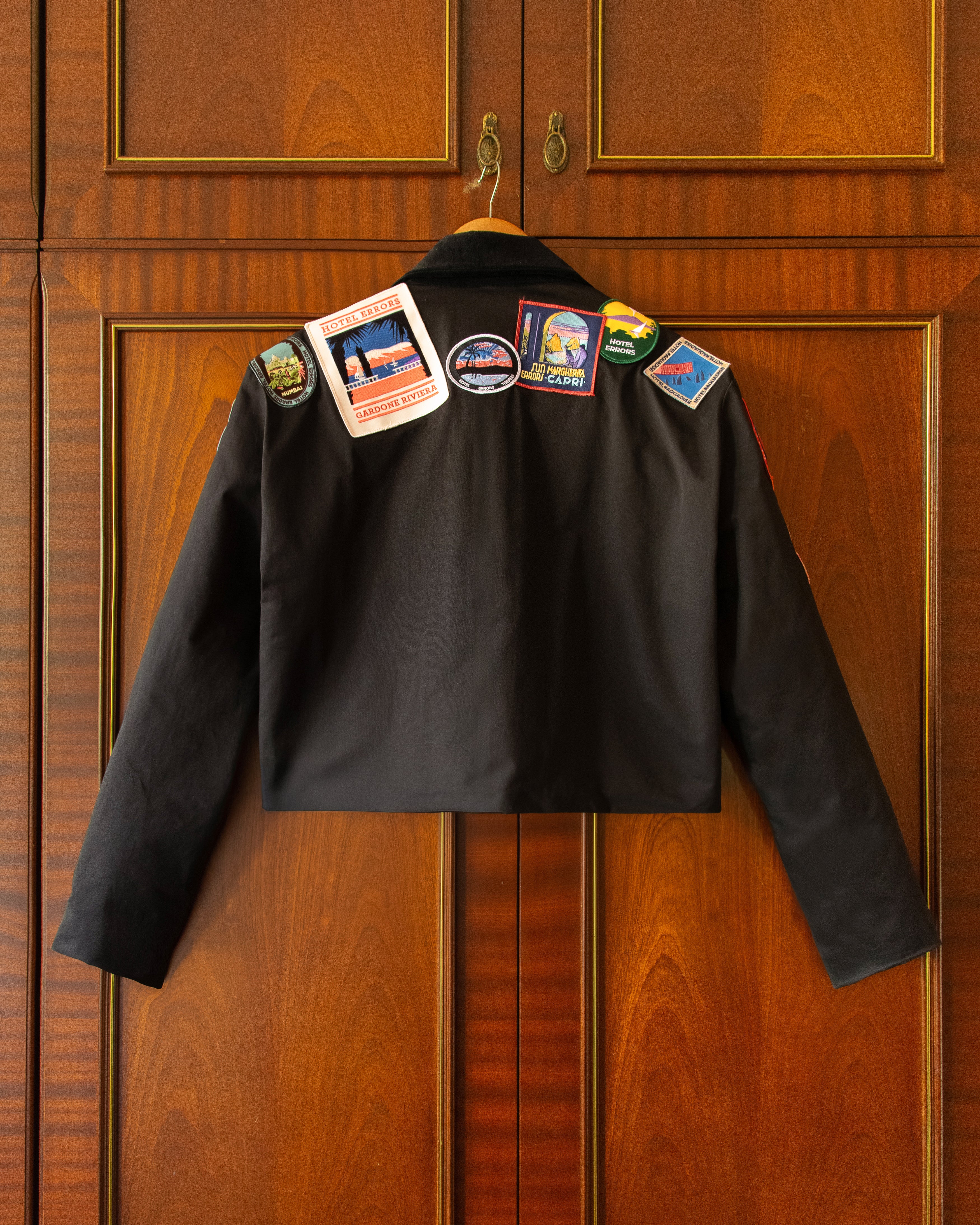 HOTEL ERRORS PATCH JACKET IN BLACK