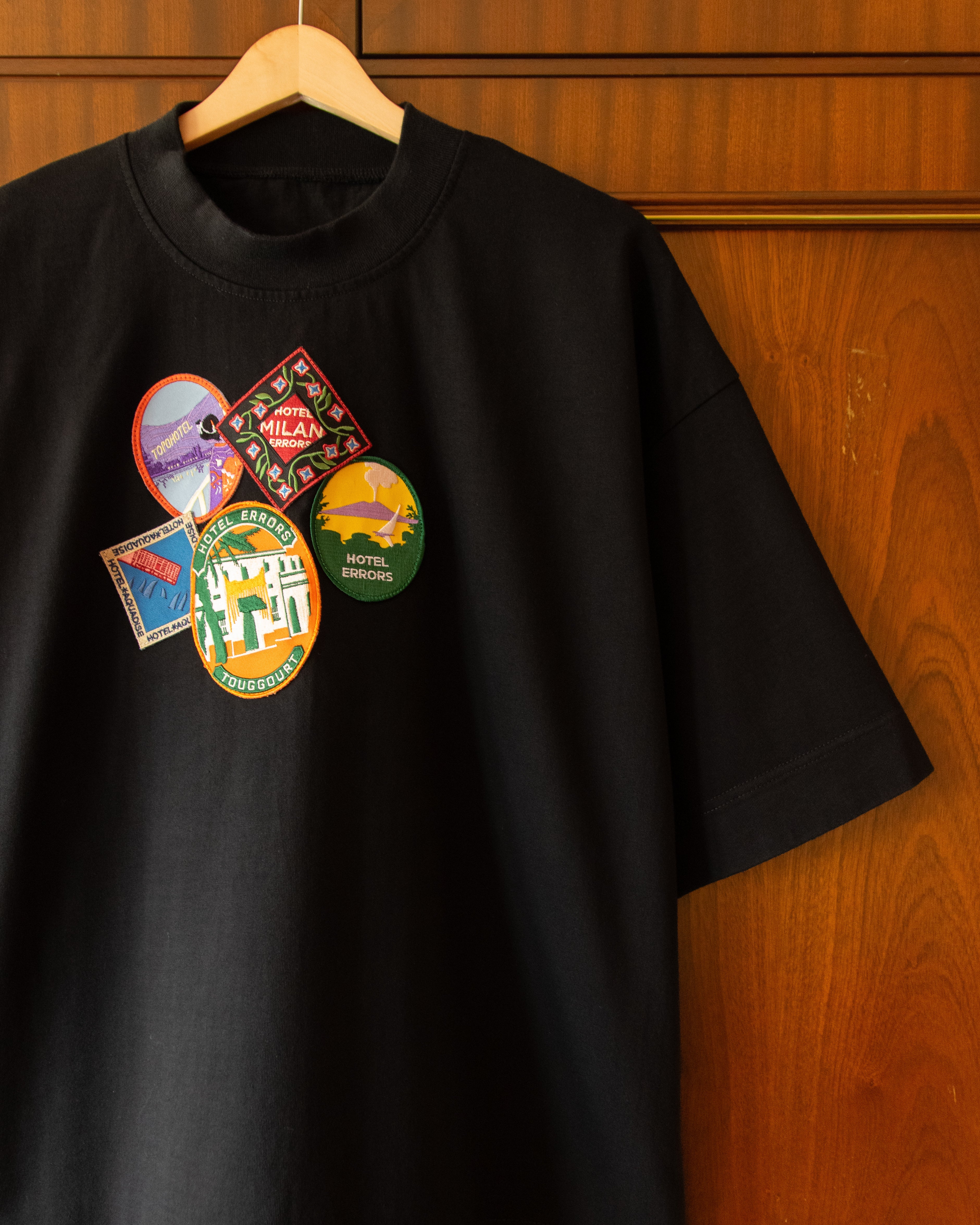 HOTEL ERRORS PATCH HEAVYWEIGHT TEE IN BLACK