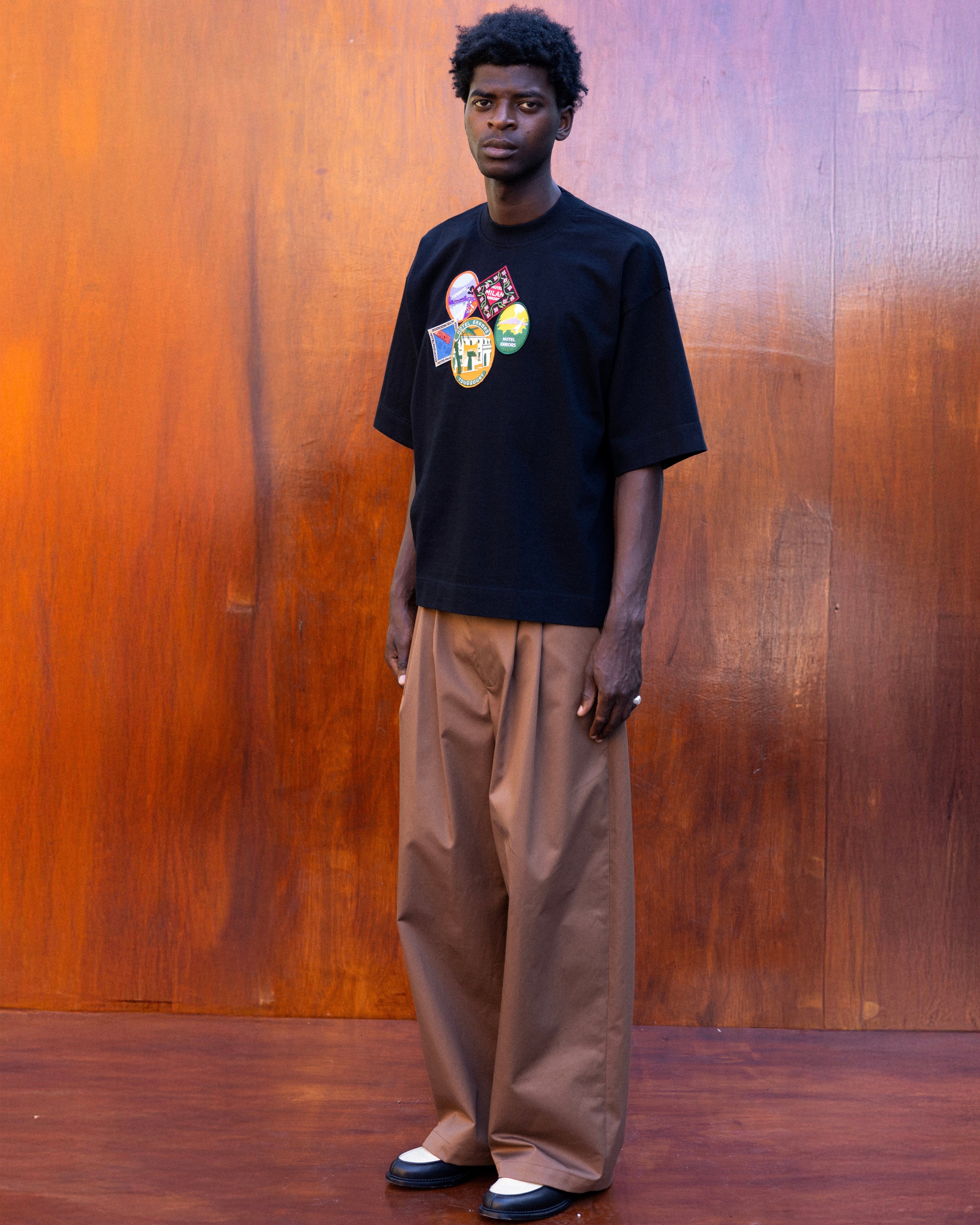 HOTEL ERRORS PATCH HEAVYWEIGHT TEE IN BLACK