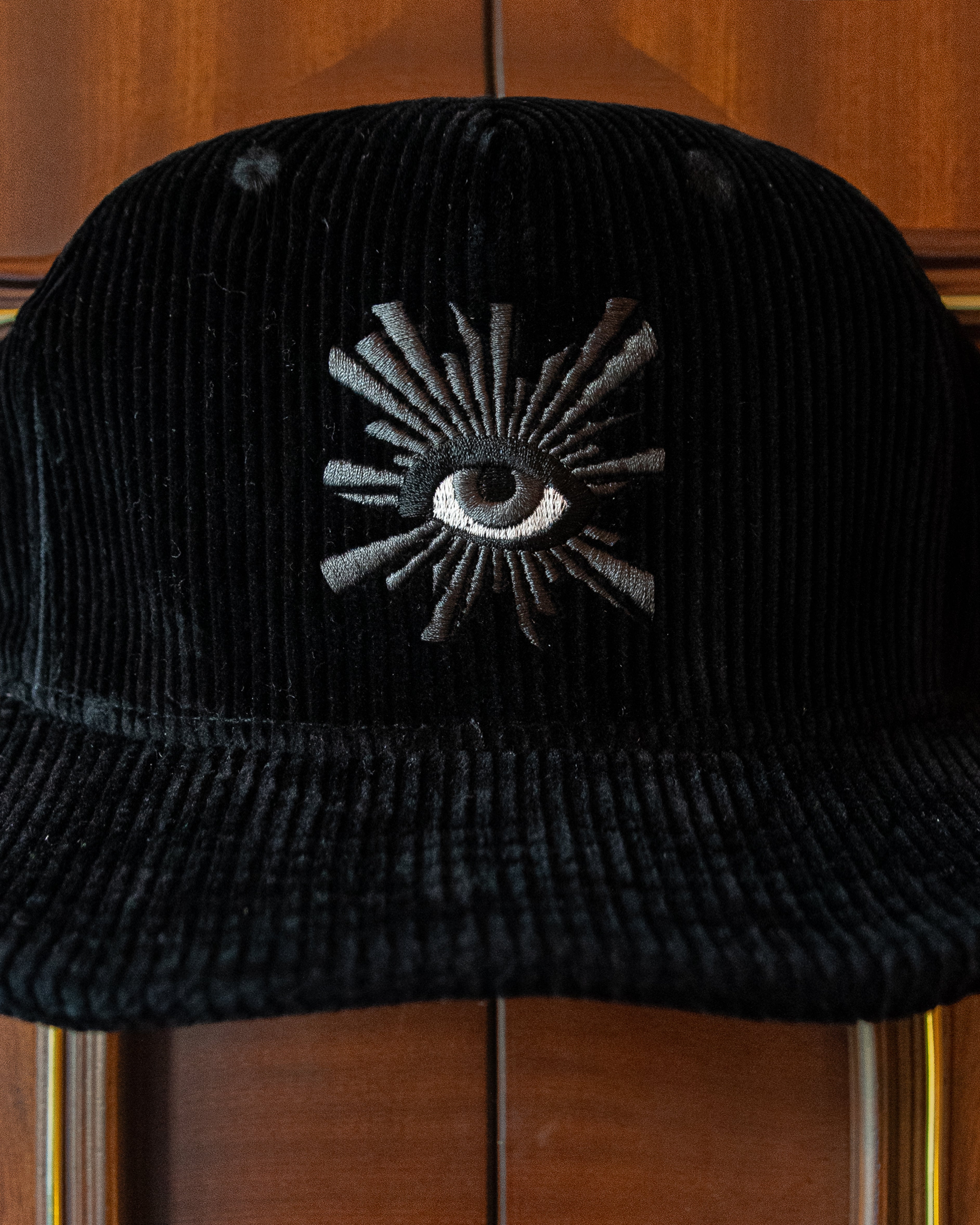 ALL-SEEING CORDUROY CAP IN BLACK